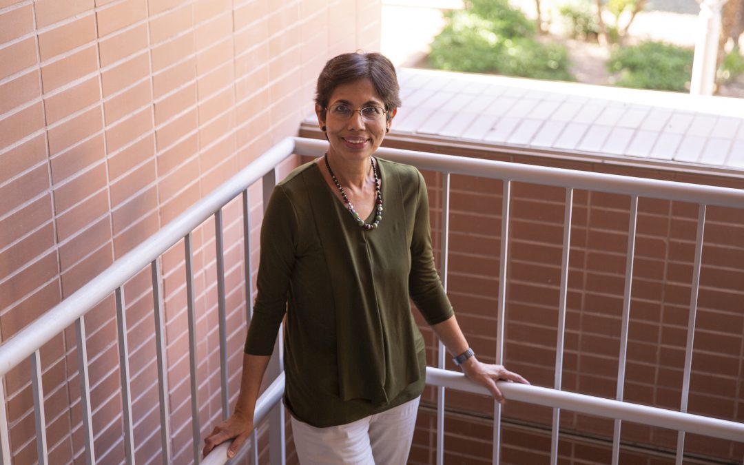 Chaitali Chakrabarti poses in the stairwell of the Goldwater Center