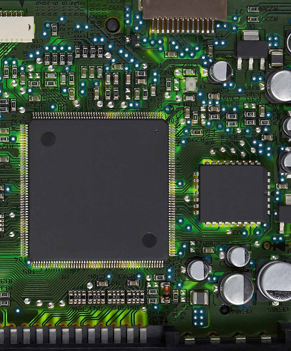 Semiconductors on a green circuit board