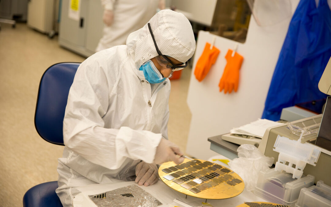 A researcher works with semiconductor materials in Trevor Thornton's lab