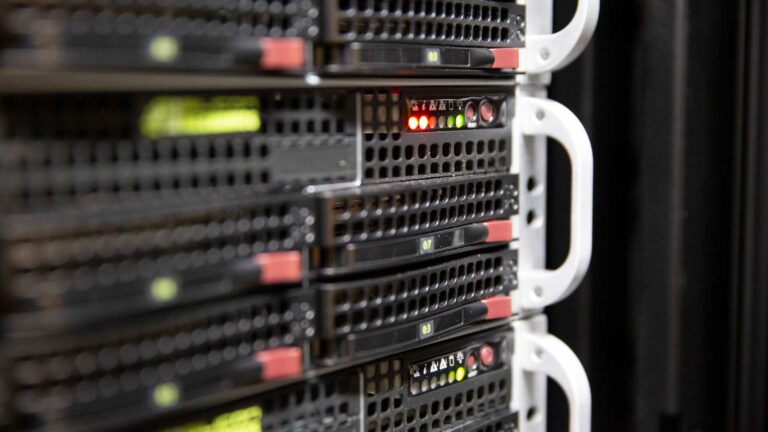 Close up of the back end of a server rack.